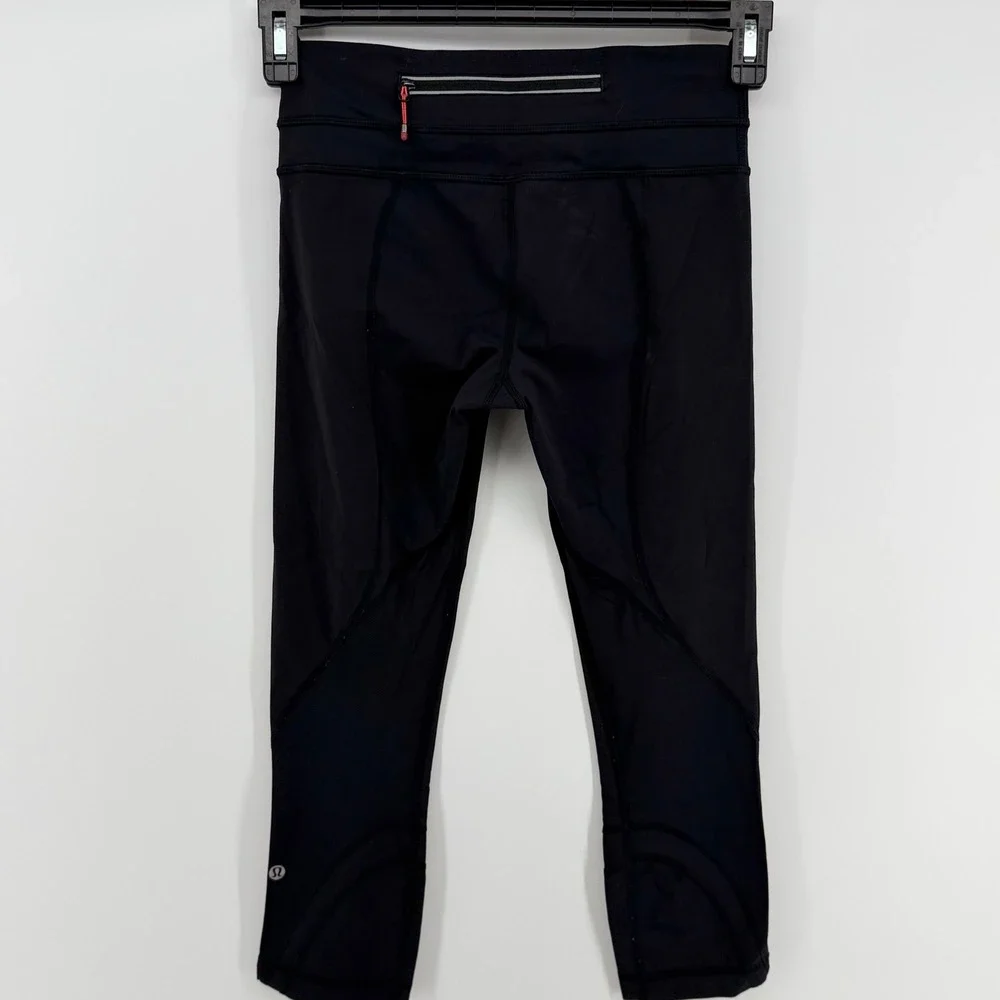 Lululemon Run Inspire Crop II Leggings Black Zip Pocket Mesh Size 4 Yoga